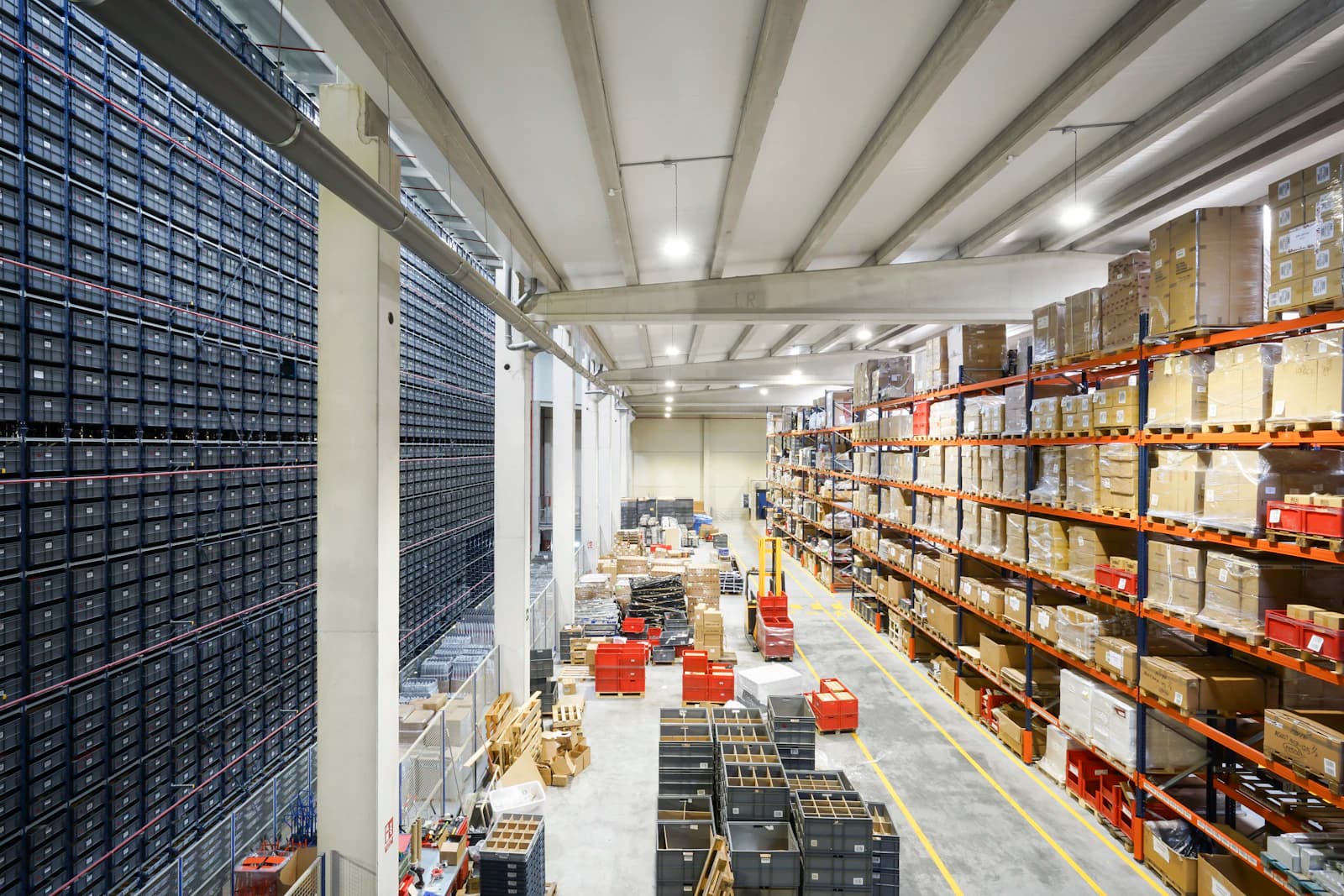 A large, bright warehouse full of boxed orders